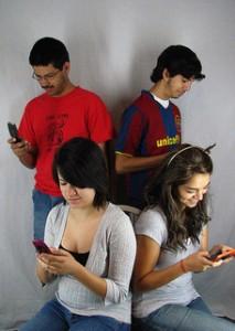 Kids texting from their cell phones