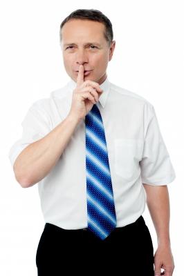 Man trying not to tell a secret
