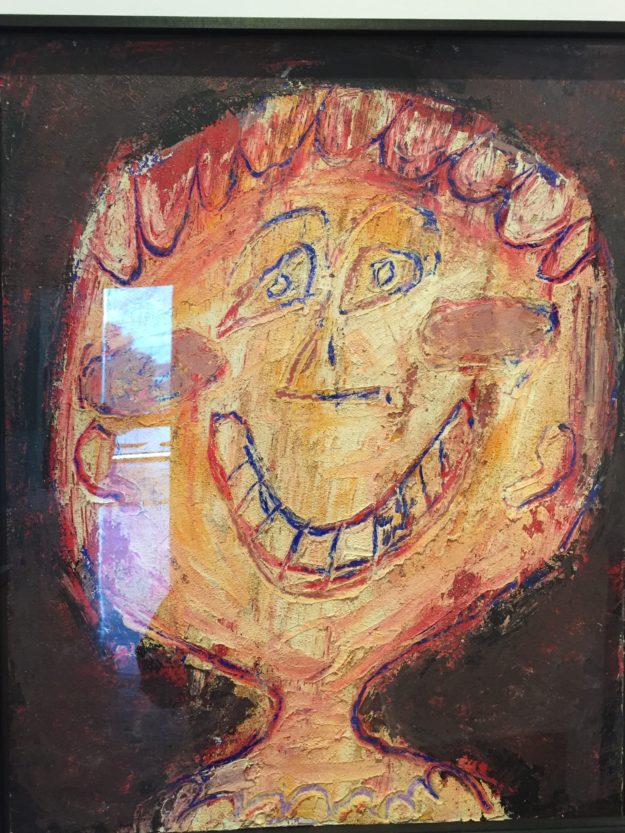 Painting of smiling person