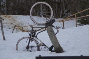 bike and cyclist stuck in a rut