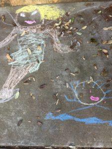 Chalk painting of mermaid and fish