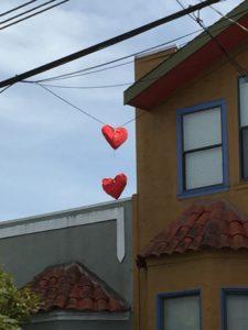 Hearts hanging from electrical wiring