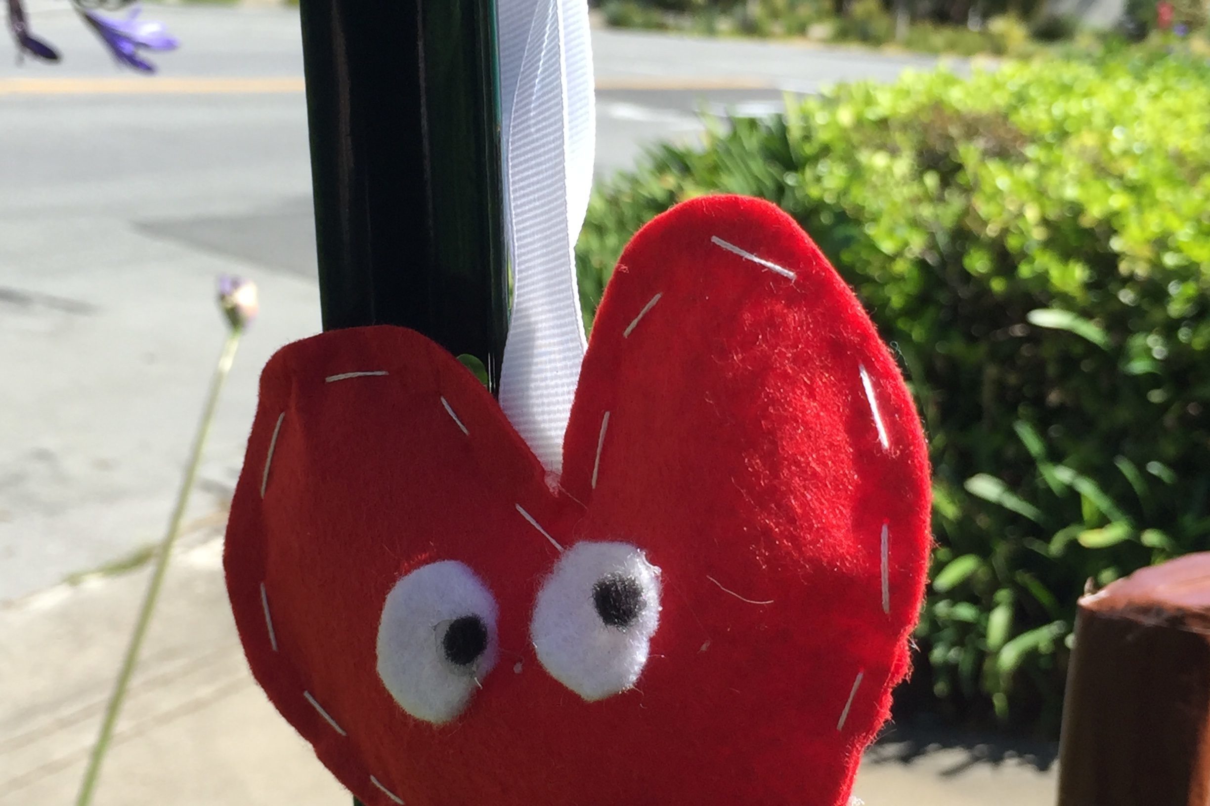 Felt heart hanging from a pole