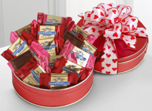 choclate bars in tin with ribbon