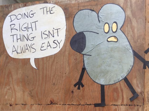 "Doing the right thing isn't always easy" storefront art