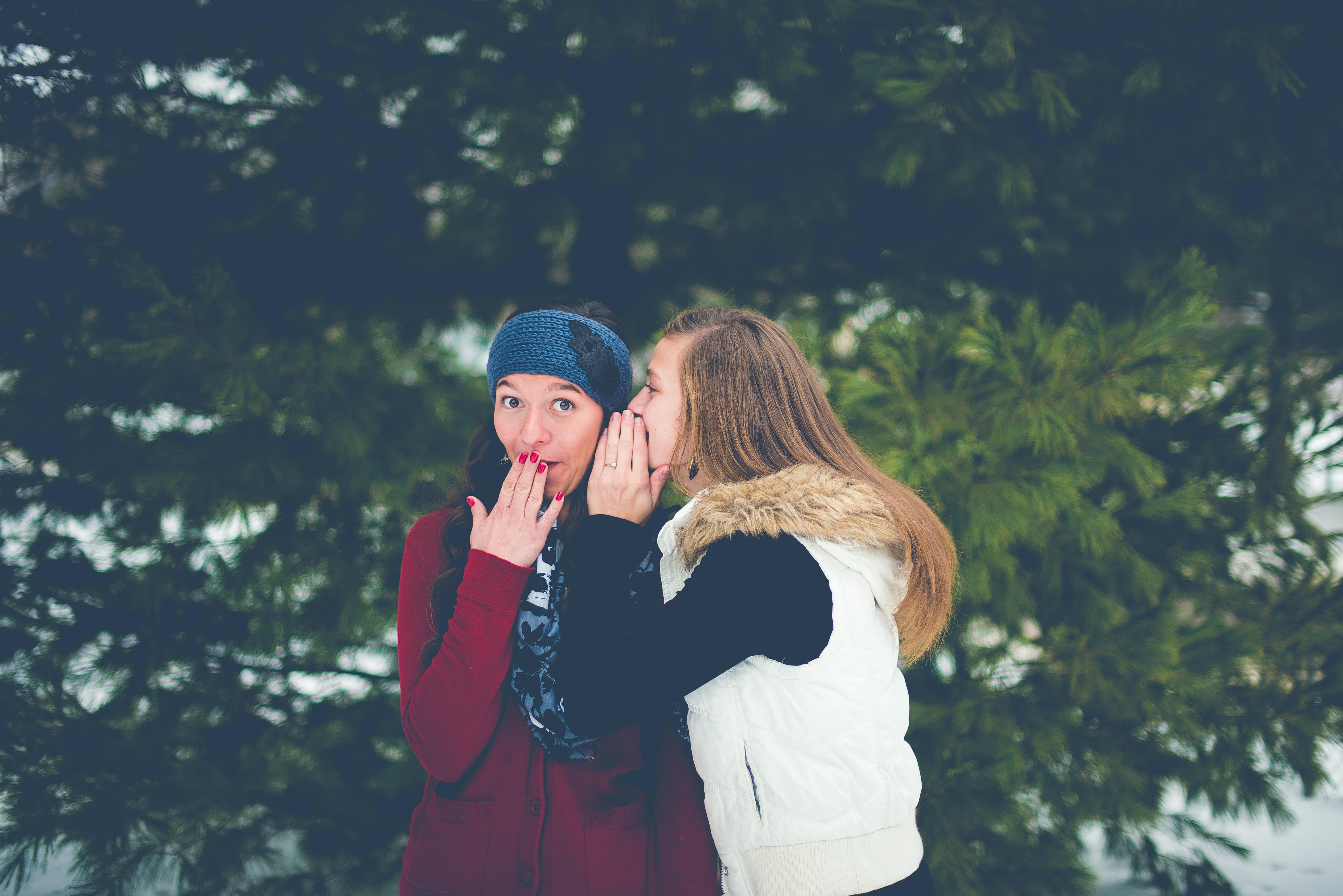 Girls sharing secrets