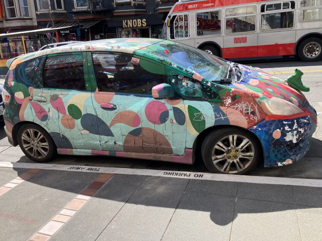 Decorated car on San Francisco street. WHAT?!?!
