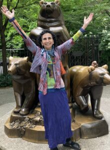 Claire posing with bears (statue)