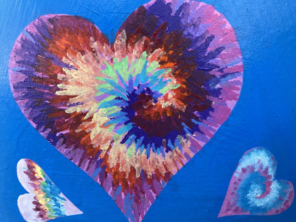 Mural on a wall with a whole lot of heart.