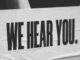 "We Hear You." Banner.