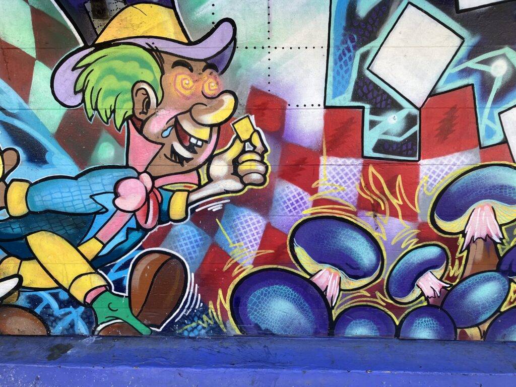 Mad Hatter racing somewhere -- wall mural.