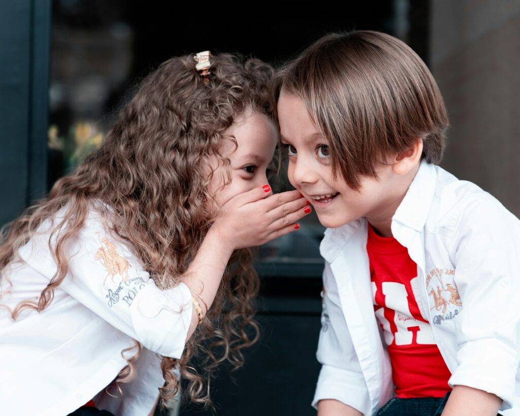 Kids sharing a secret
