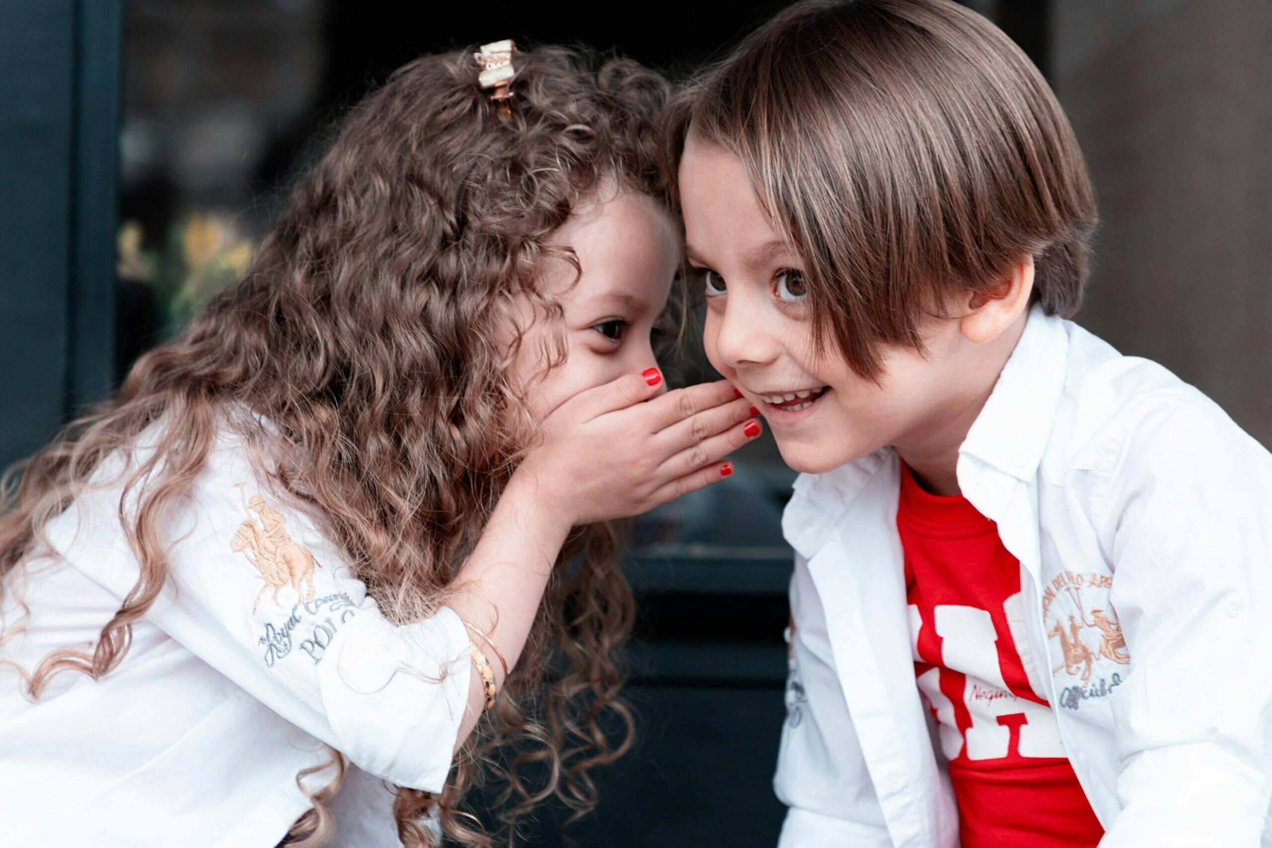 Kids sharing a secret