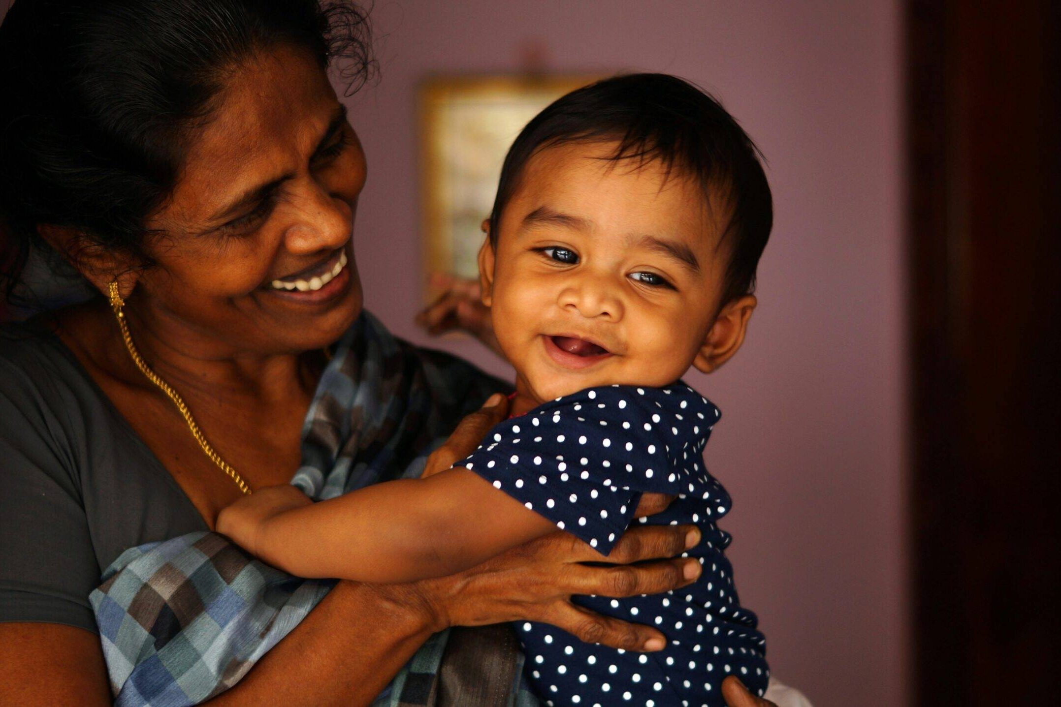 Mother and child hugging