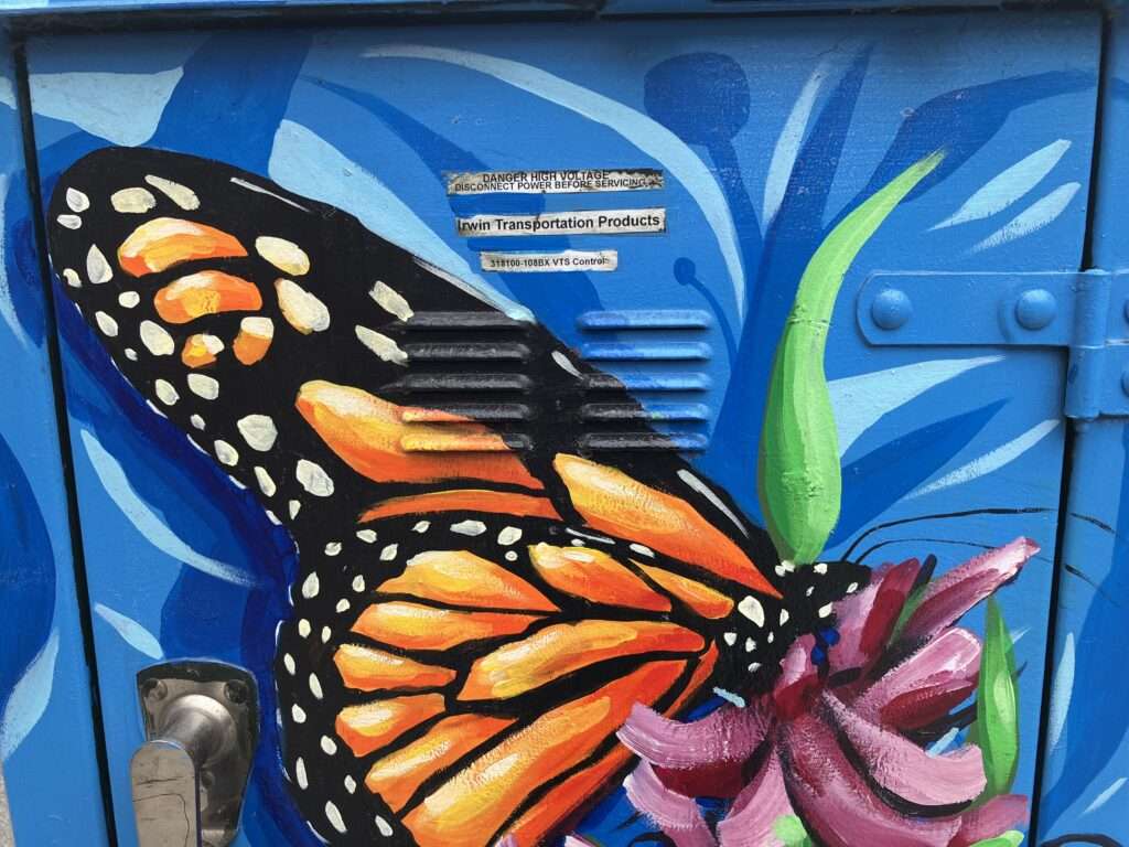 Butterfly painted on utility box