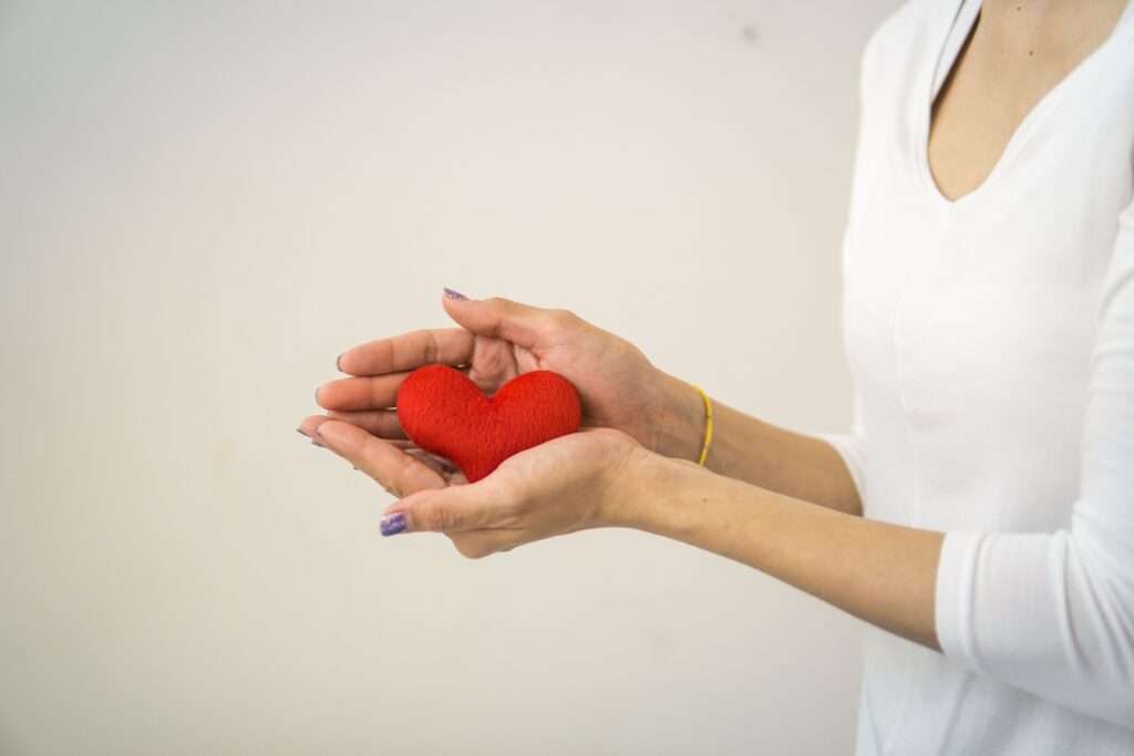 Heart in palm of hands