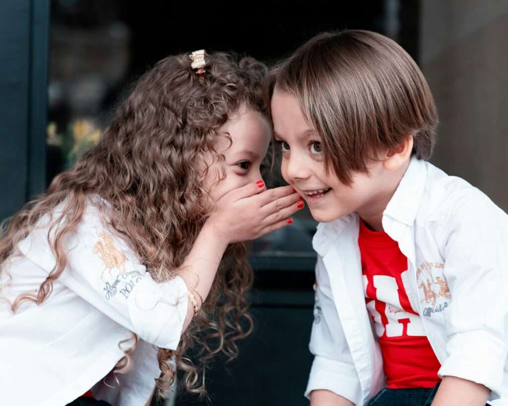 Kids sharing a secret